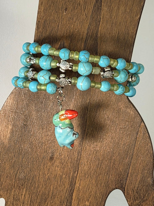 Bracelet with Turquoise Dyed Howlite Stone Green Glass Bead with Silver Turtle Charms with Toucan Dangle