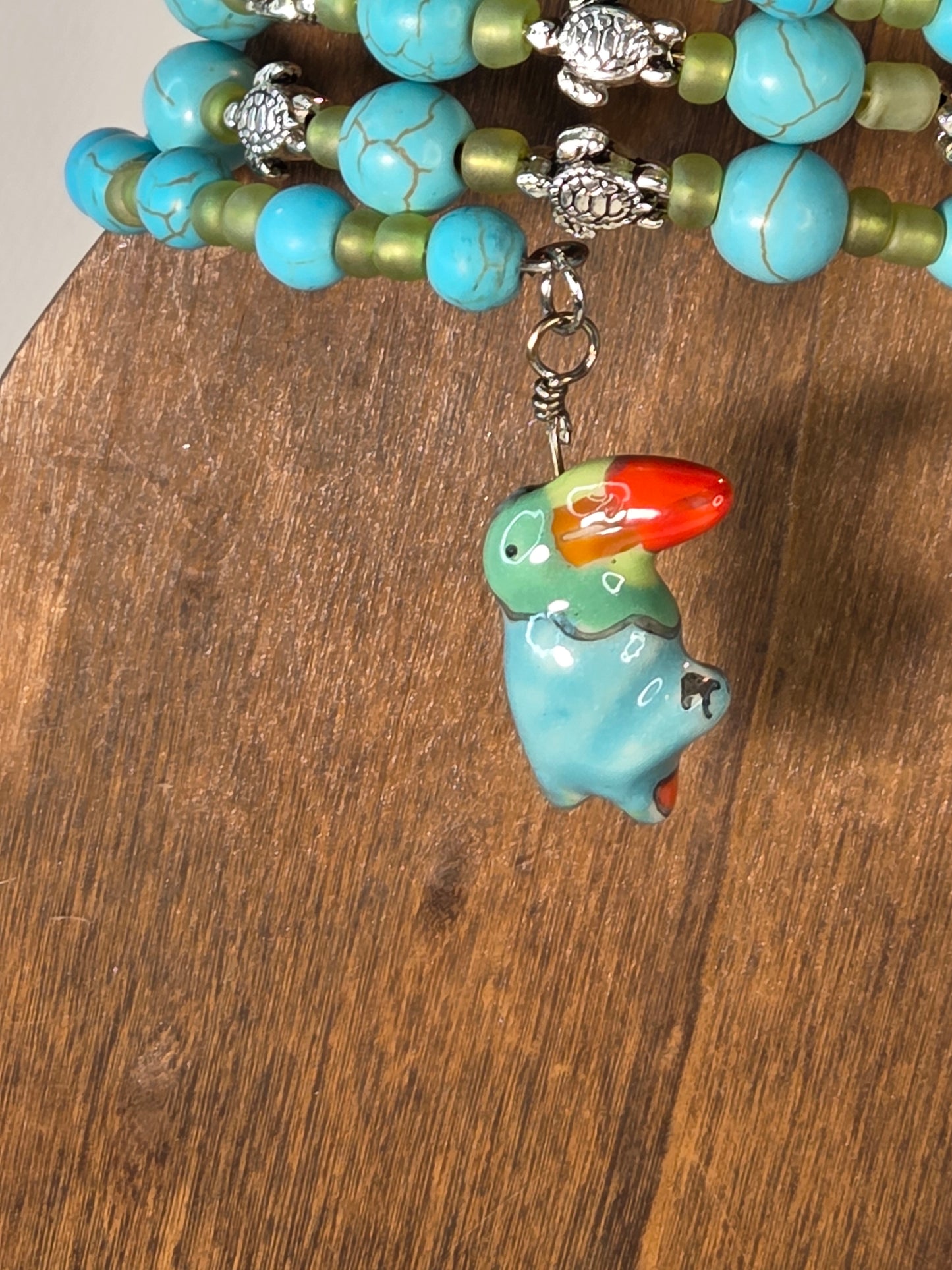 Bracelet with Turquoise Dyed Howlite Stone Green Glass Bead with Silver Turtle Charms with Toucan Dangle