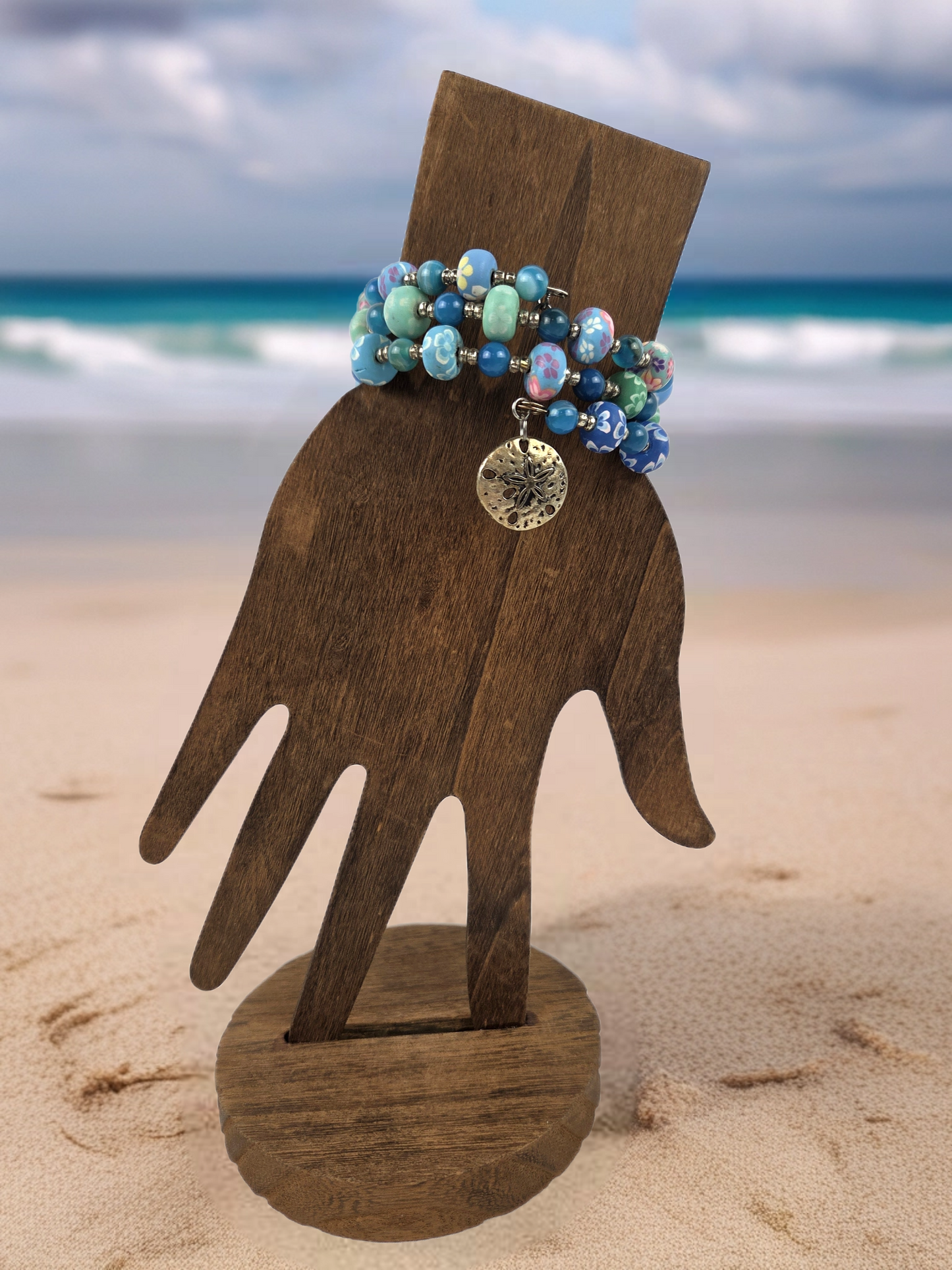 Bracelet with Floral Ceramic Beads and Silver Beads with Starfish Dangle